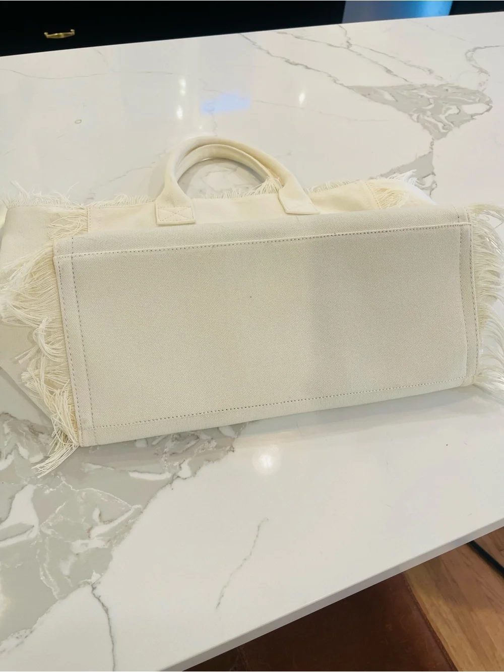 Dolce Vita Cream Canvas Fringe Tote with Light Blue Logo